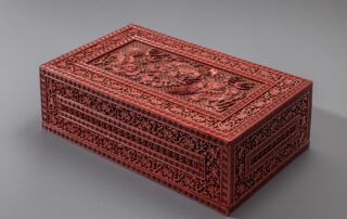 A rare imperial cinnabar lacquer ‘Buddhist lions’ treasure box and cover (Qianlong six-character and Suanni Baohe four-character marks and of the period)