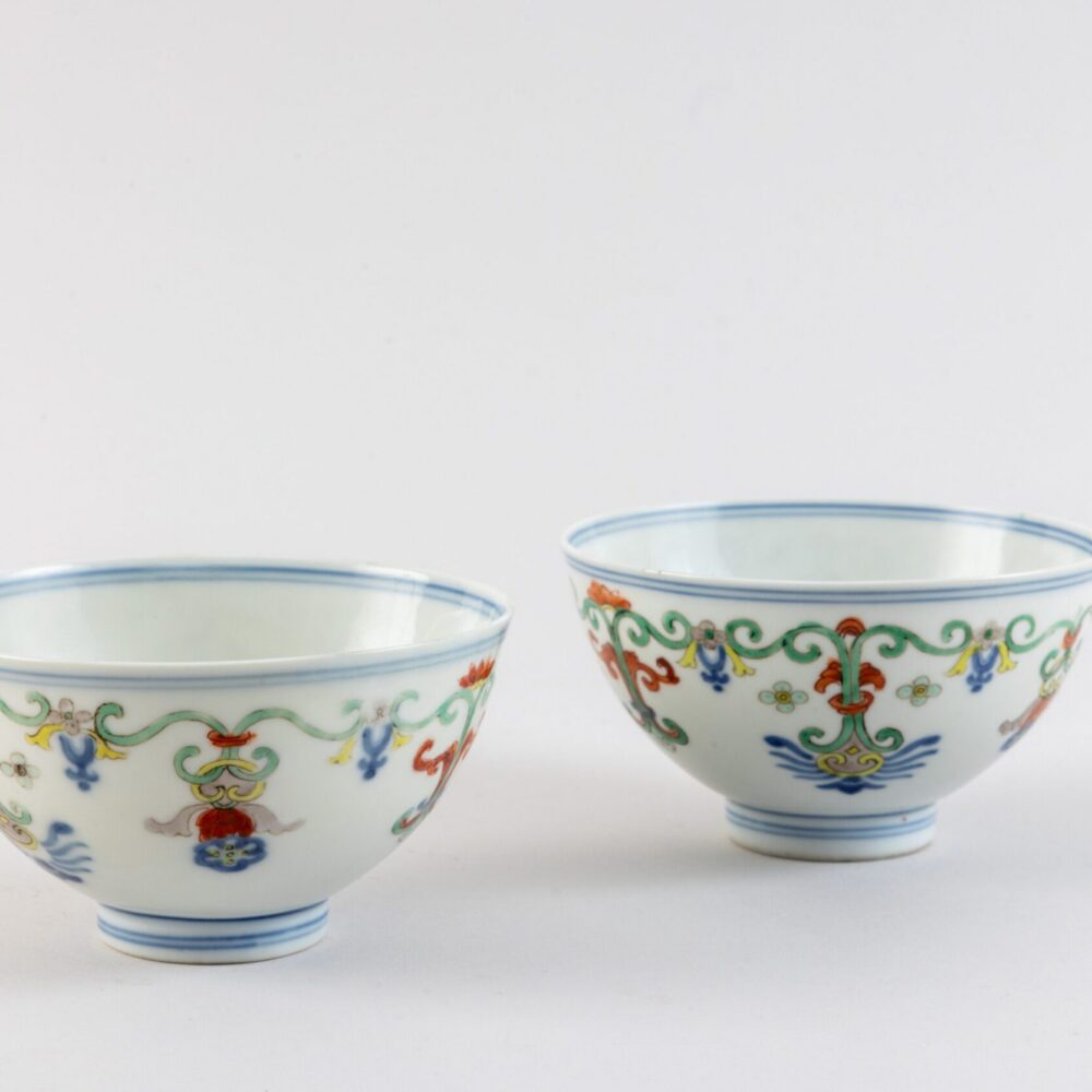 A pair of doucai ‘honeysuckle’ bowls (Jiaqing mark and period, 1796-1820)