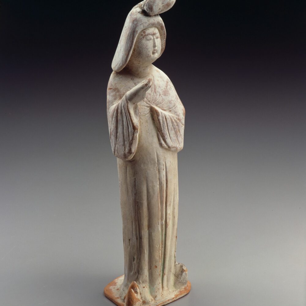 A pottery figure of a standing courtier (Tang dynasty (618-907 AD), early 8th century)