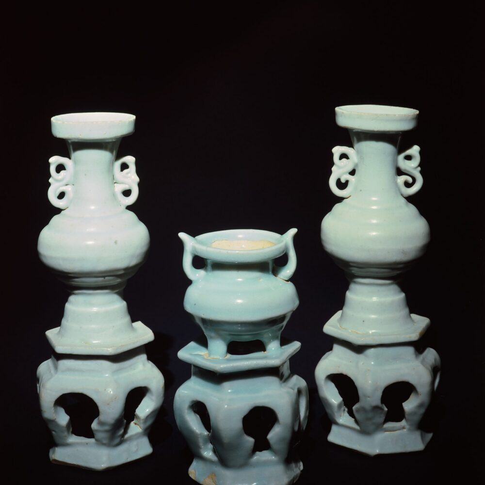A pair of miniature ‘Qingbai’ 'vases, ‘hu’ and integral stands (Yuan dynasty, 13th/14th century)