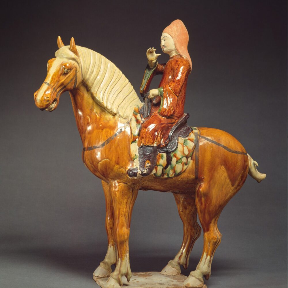 A ‘sancai’ pottery figure of an equestrian musician (Tang dynasty, 618-907 AD)