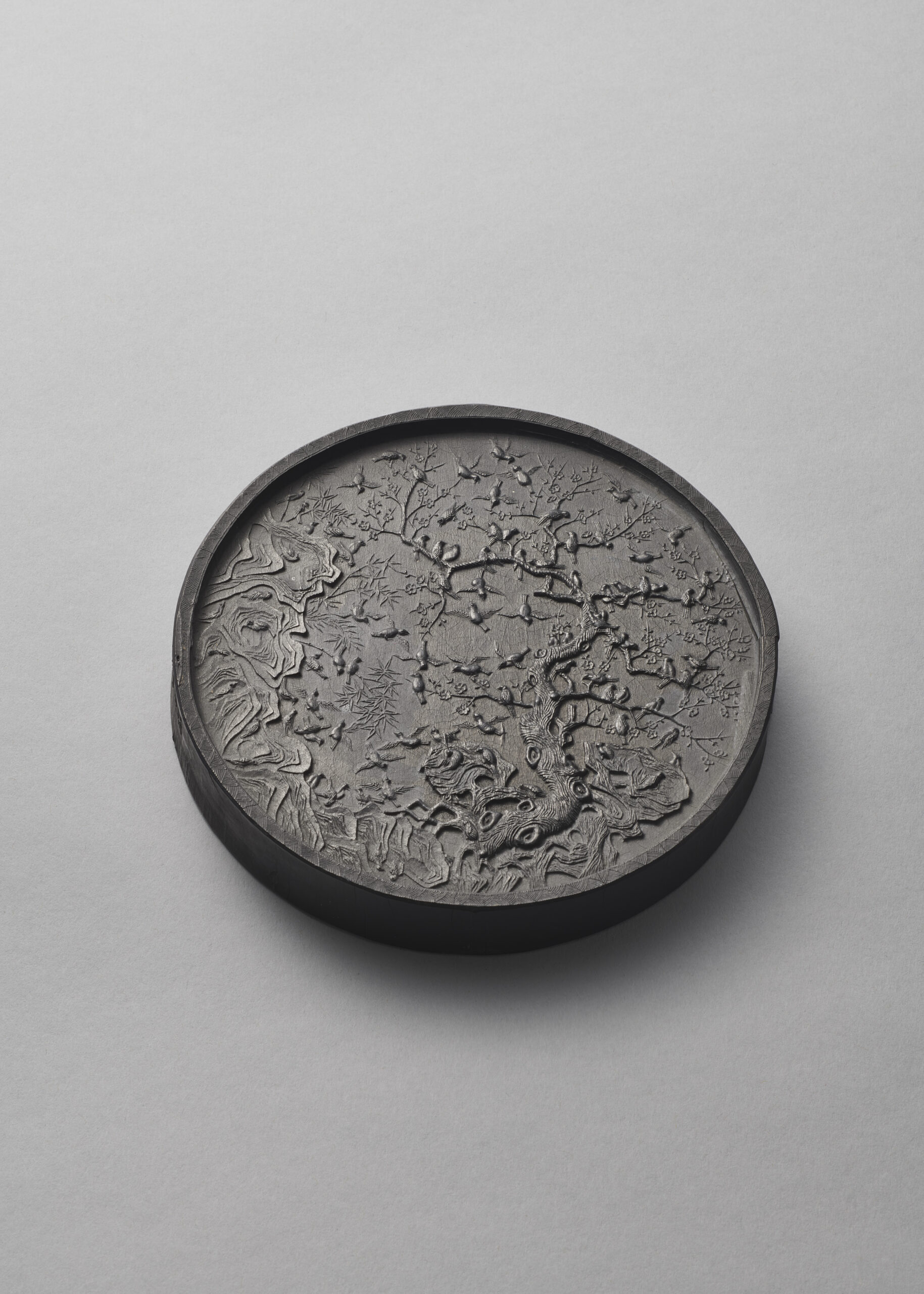 An important dated and inscribed ‘magpie and prunus’ ink cake (Tianqi first year, corresponding to 1621 and of the period)