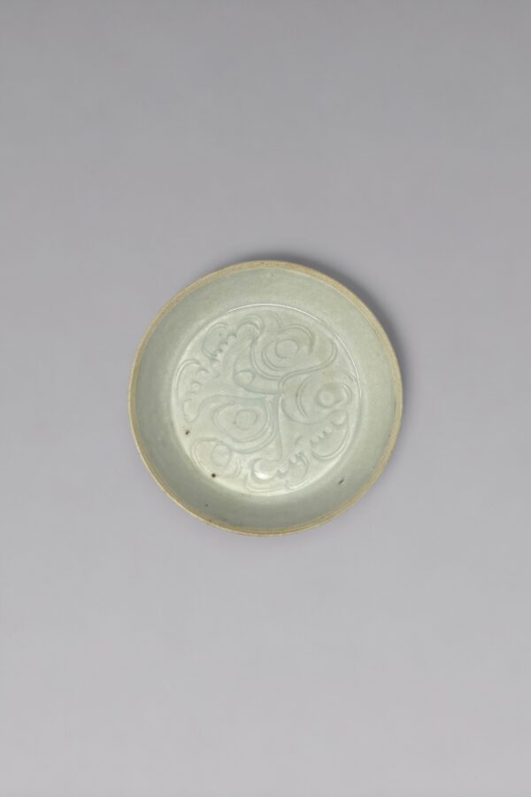 A carved Qingbai floral washer  (Southern Song dynasty, 1127-1279)