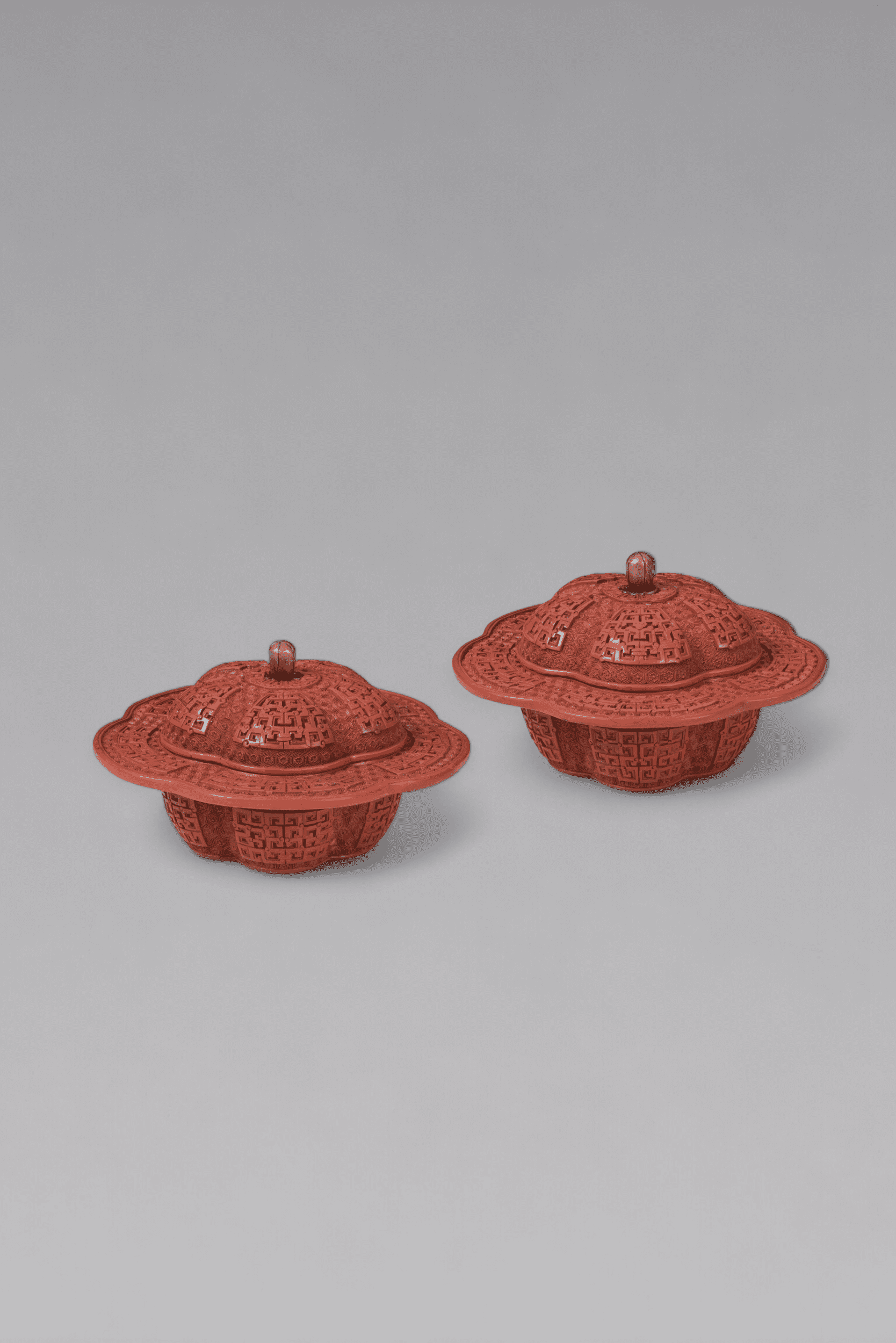 A pair of carved cinnabar lacquer lobed boxes and covers, ‘zhadou’ (Qianlong period, 1736-1795)