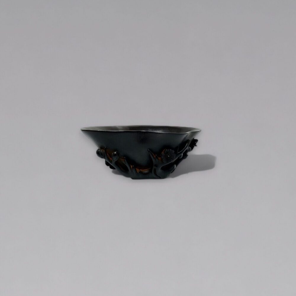 A zitan ‘prunus and magnolia’ libation cup (18th/19th century)