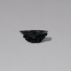 A zitan ‘prunus and magnolia’ libation cup (18th/19th century)