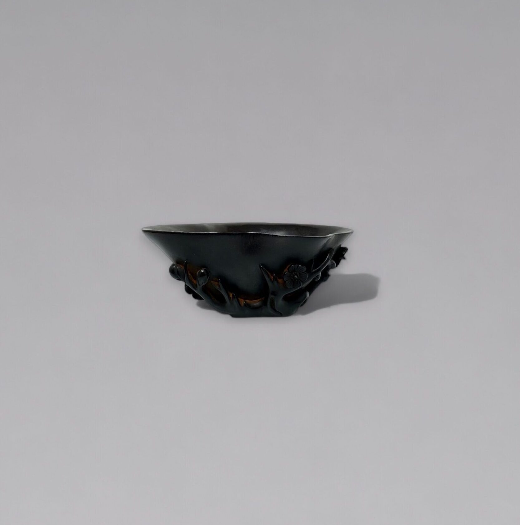 A zitan ‘prunus and magnolia’ libation cup (18th/19th century)