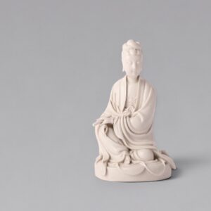 A Dehua figure of a seated Guanyin