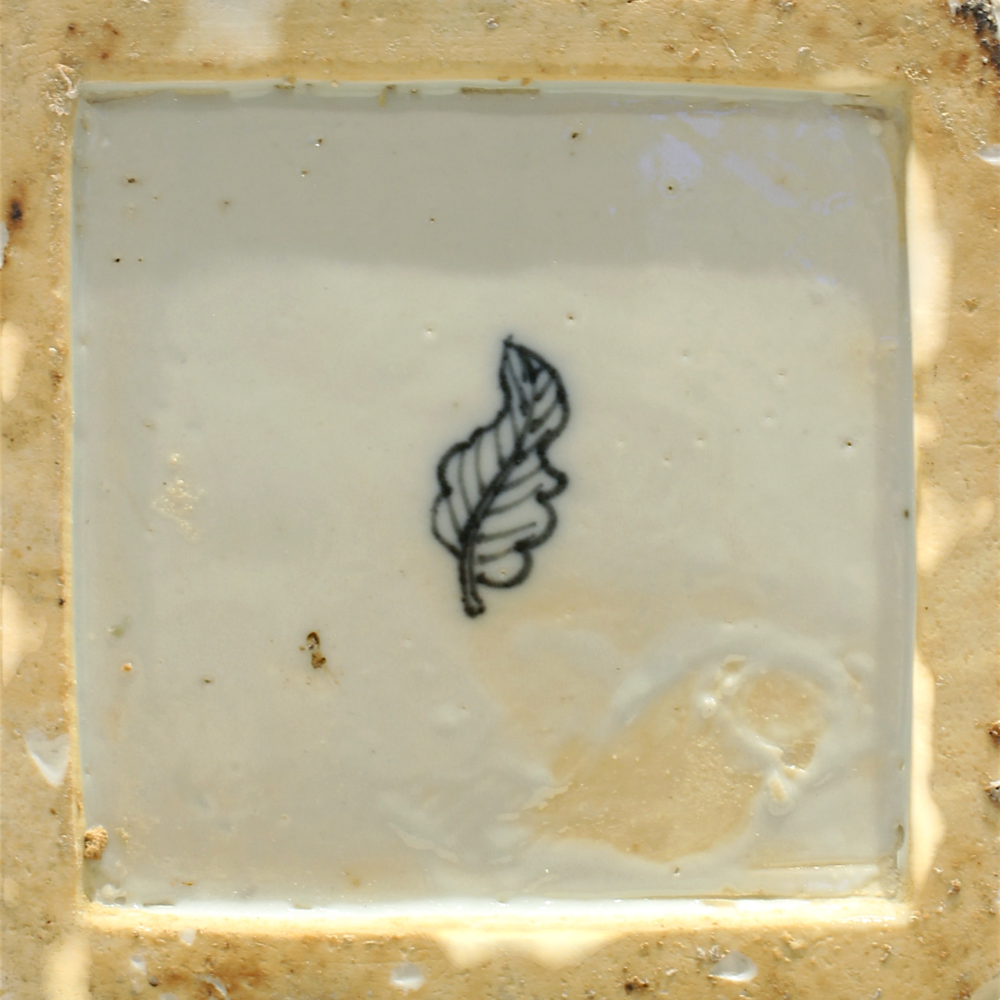 A blue and white square-form flask and cover (mark)
