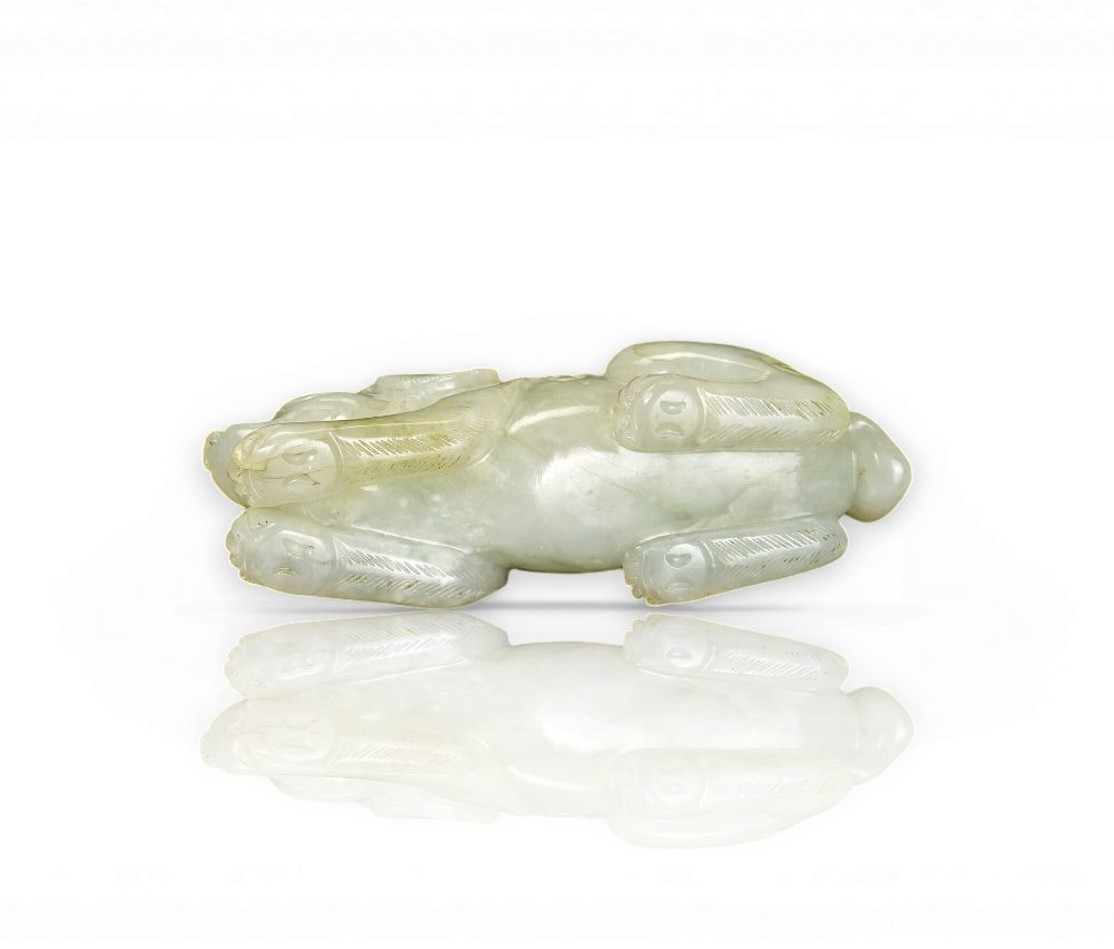 A celadon jade carving of a bear
