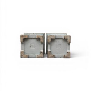 A pair of famille-verte biscuit-glazed openwork brushpots, ‘bitong’ (Kangxi period) (base)
