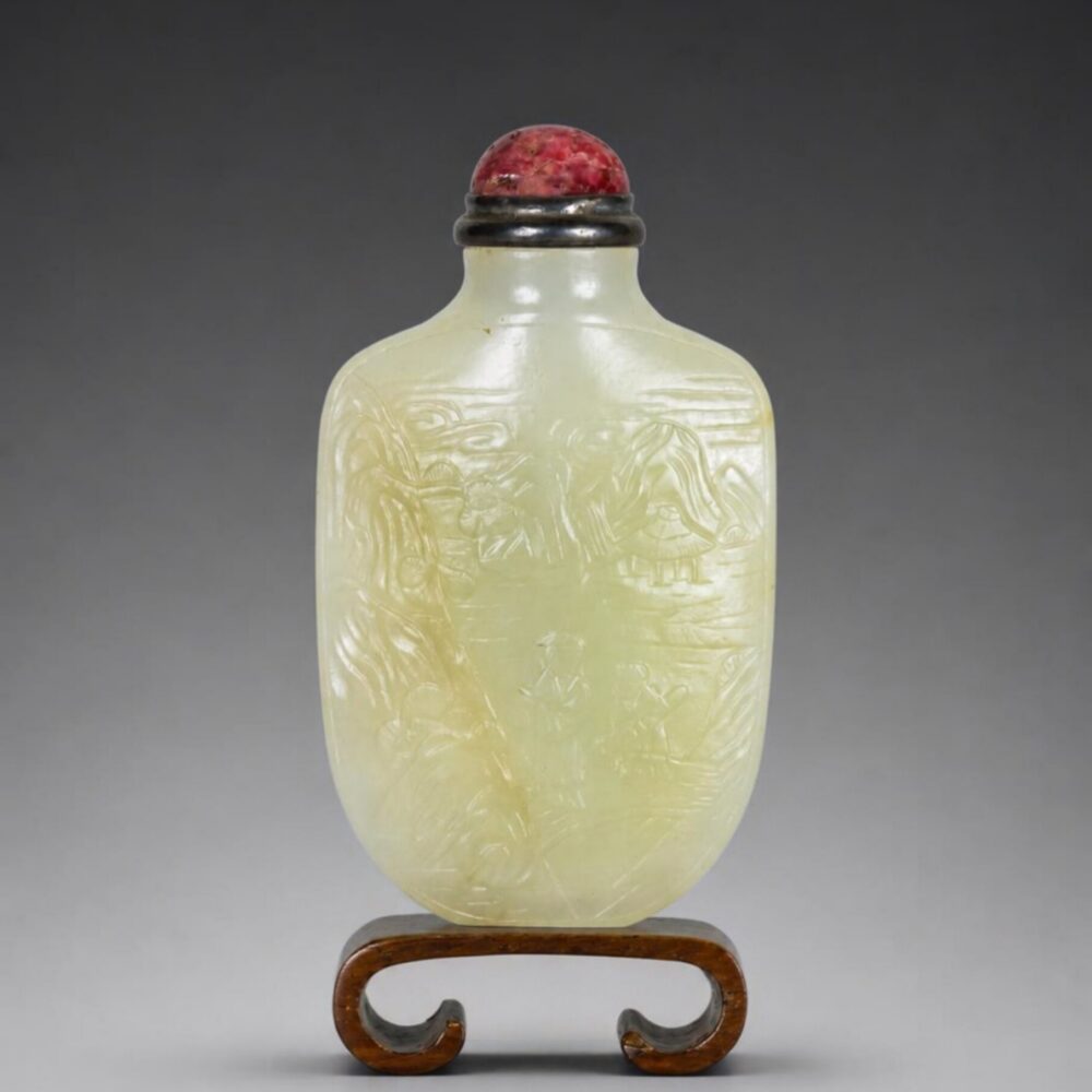 A white jade ‘landscape and poem’ snuff bottle